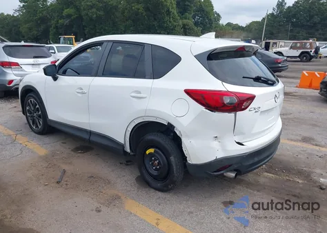 2016 Mazda Cx-5 Grand Touring z USA, uszkodzony, nr VIN JM3KE4DY5G0661185